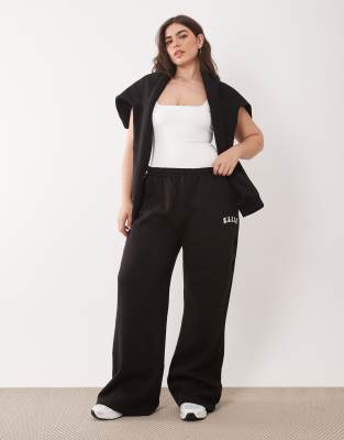 Kaiia Plus - Pantalon de jogging ample d'ensemble en coton mélangé - Noir