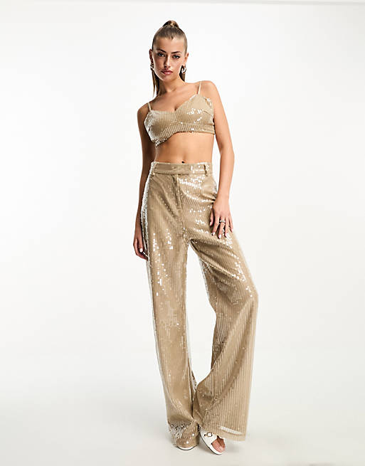 https://images.asos-media.com/products/kaiia-sequin-cropped-cami-bralet-top-in-gold-part-of-a-set/204936947-4?$n_640w$&wid=513&fit=constrain