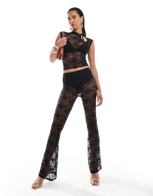 sheer lace flare pants in black - part of a set