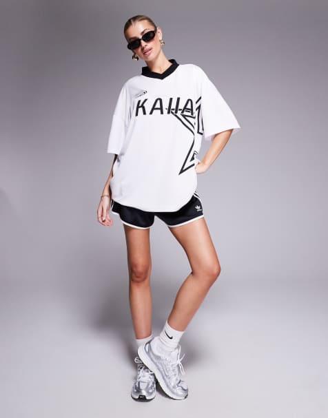 Kaiia sport oversized star logo football jersey in white and black
