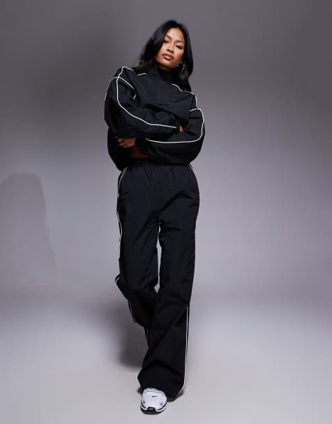 Kaiia sport contrast trim side stripe wide leg windbreaker track sweatpants in black - part of a set - view 1