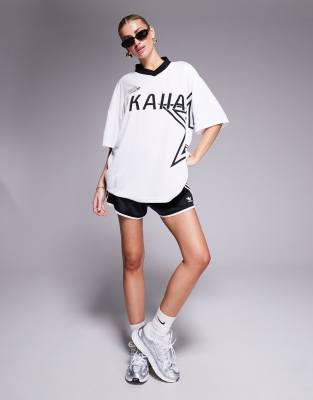 Kaiia - Sport - Hvid/sort oversized fodboldtrøje med stjernelogo