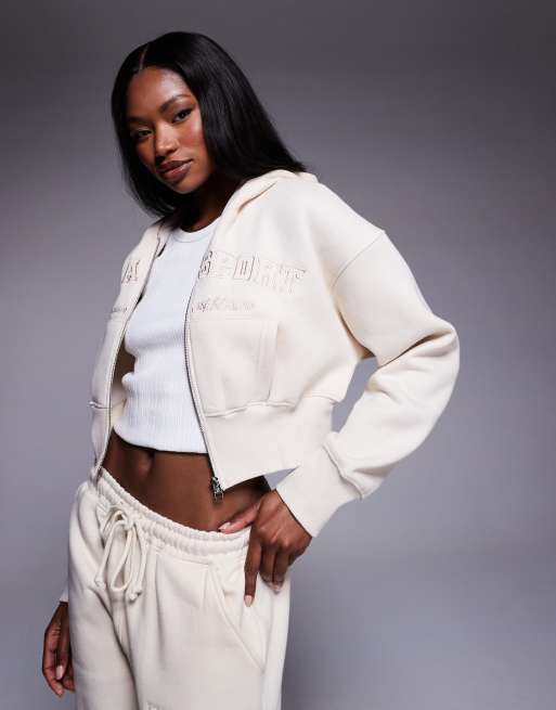 Kaiia - Sport - Oversized cropped hoodie met rits en geborduurd logo in crème, deel van co-ord set