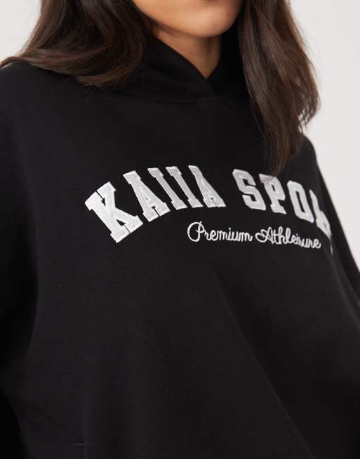 Kaiia - Sport - Oversized sort hættetrøje med broderet hvidt logo, 4 af 4