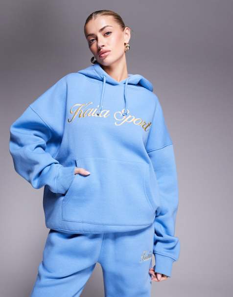 Kaiia Sport - Sweat à capuche d'ensemble avec inscription logo brodée - Bleu/jaune - view 1