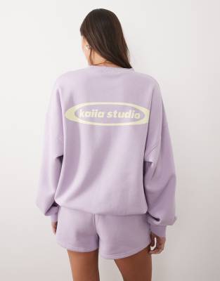 Kaiia Studio cotton rich printed logo oversized sweatshirt in lilac and lemon - 