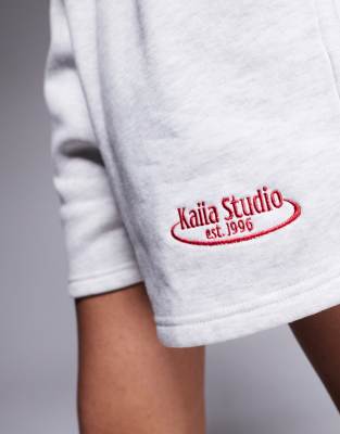 KAIIA STUDIO DRAWSTRING WAIST EMBROIDERED LOGO SWEAT SHORTS 