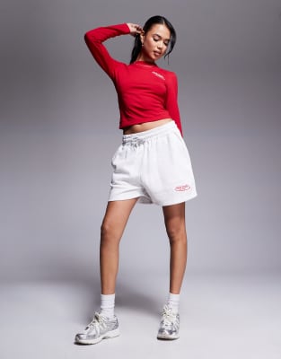 KAIIA STUDIO EMBROIDERED LOGO LONG SLEEVE TOP 