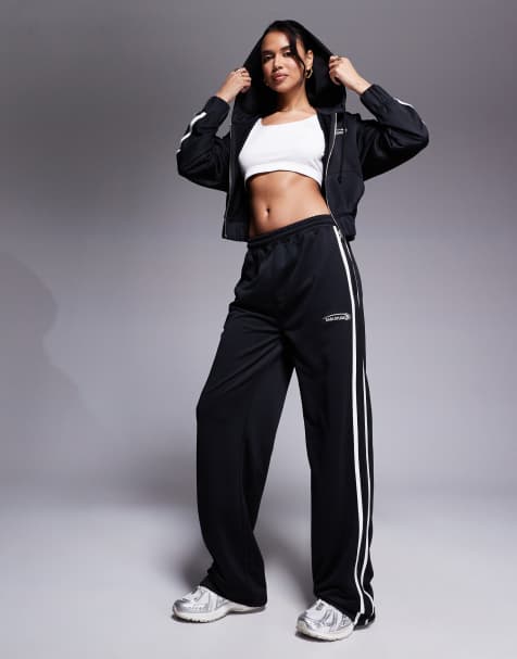 Kaiia - Studio - Joggingbroek met wijde pijpen, logo en zijstreep in zwart, deel van co-ord set - view 1