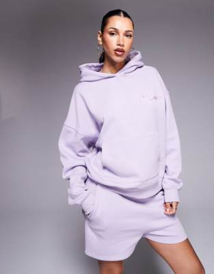 Kaiia Studio - Oversize-Kapuzenpullover in Flieder und Rosa mit aufgesticktem Wirbel-Logo, Kombiteil-Lila