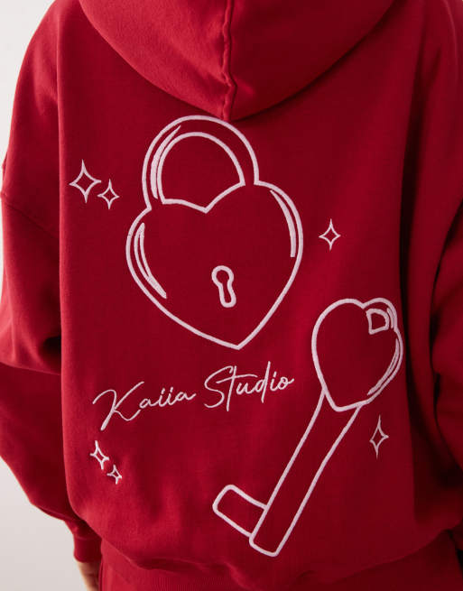 Kaiia - Studio - Sweat à capuche d'ensemble oversize en coton majoritaire à broderies cadenas et clé dans le dos - Rouge et rose, 3 de 4