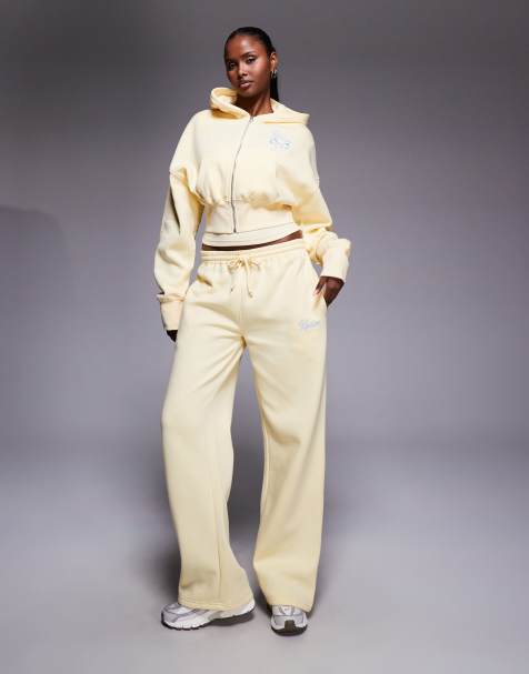 Kaiia - Sweat à capuche d'ensemble court à fermeture éclair en coton majoritaire avec broderie logo et nœud - Jaune citron/bleu - view 1