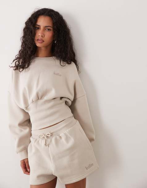 Kaiia sweatshirt-set med kraftigt oversized ärmar och markerad midja i beige - view 1