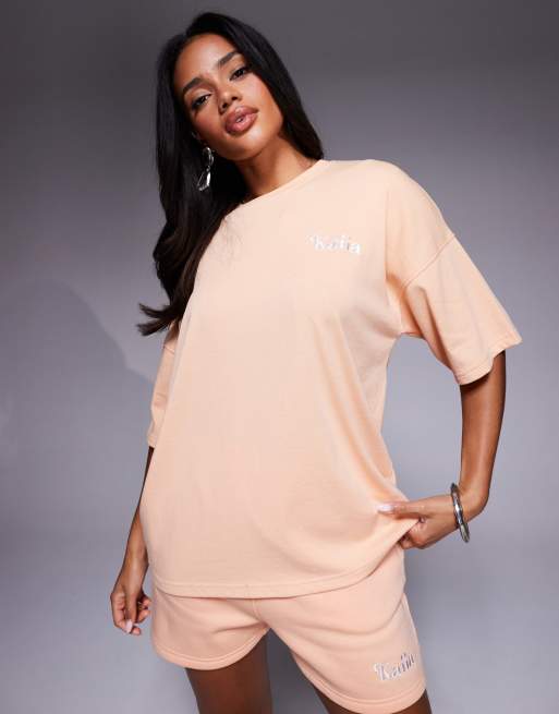 Kaiia - T-shirt oversize en coton majoritaire avec imprimé tongs et Capri - Pêche  , 4 de 4