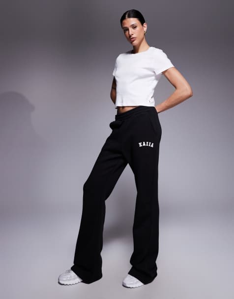 Kaiia Tall cotton blend embroidered logo wide leg joggers in black - view 1