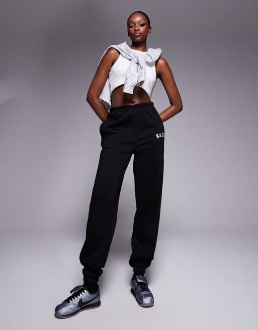Kaiia Tall embroidered logo cuffed trackies in black