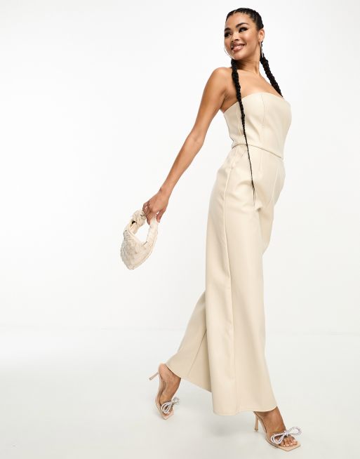 Kaiia - Tuta jumpsuit a fondo ampio a fascia in pelle sintetica color pietra