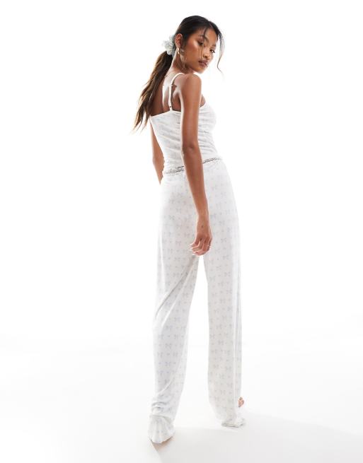 Kaiia wide leg pyjama bottoms co-ord in cream and blue bow print with lace trim, 2 of 4