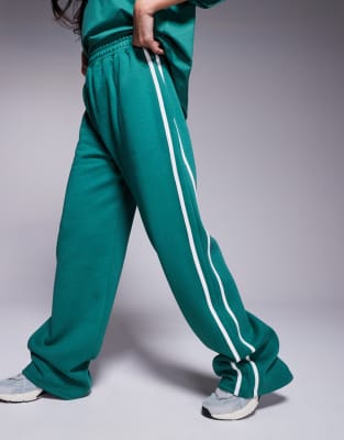 Kaiia Wide Leg Side Stripe Sweatpants In Green