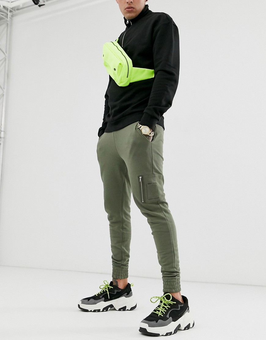 Kakifarvet skinny joggingbukser med MA1 lomme fra ASOS DESIGN-Grøn