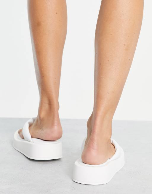 White platform flip on sale flops