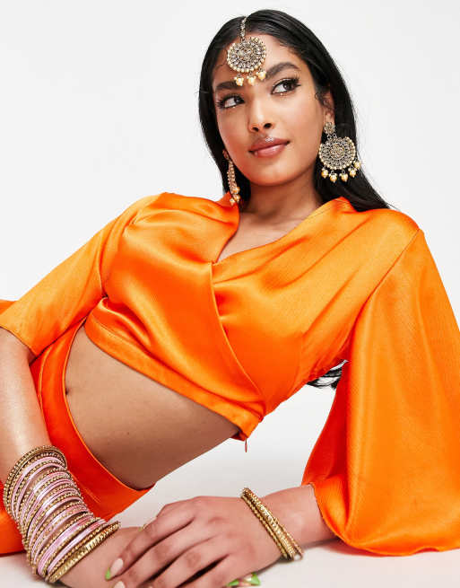 Kanya London - Crop top met fladdermouwen in zonsondergangoranje