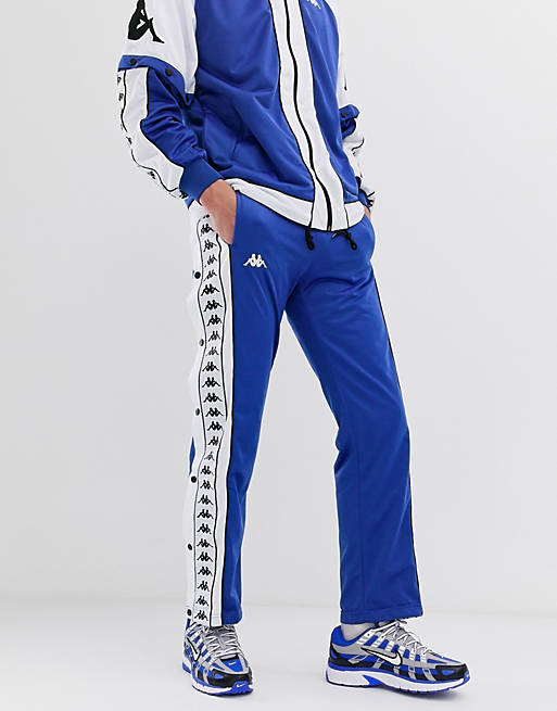 Kappa – Trainingsanzug in Blau/Weiß mit Druckknöpfen und Logoband | ASOS