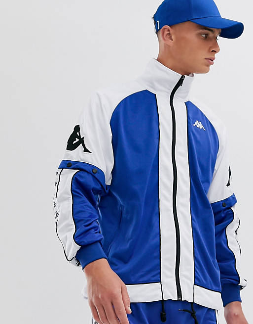Kappa – Trainingsanzug in Blau/Weiß mit Druckknöpfen und Logoband | ASOS