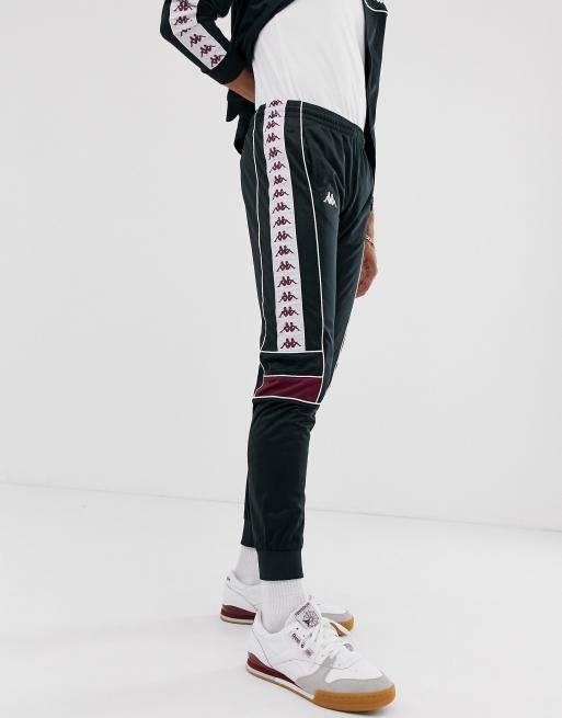 Kappa slim fit tracksuit with multi-logo taping in black | ASOS