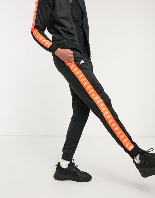 black and orange nike tracksuit