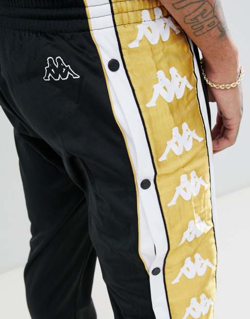 Black and hot sale gold kappa tracksuit