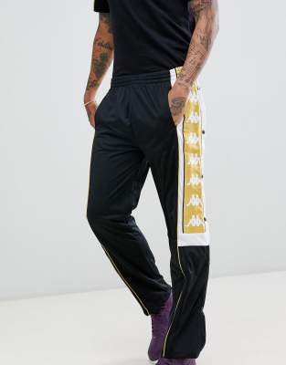 kappa tracksuit black and gold