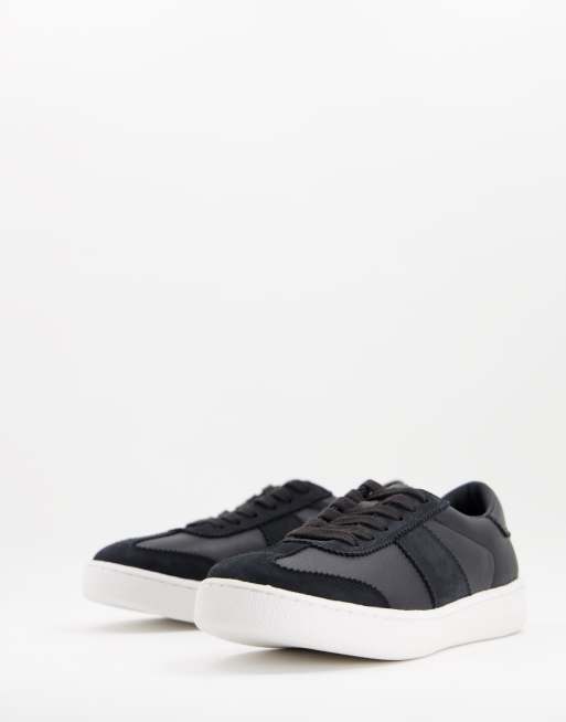 Karen Millen side stripe trainers in black and leopard