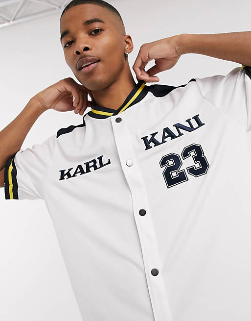 Ongoing Previous Drill Karl Kani College baseball shirt in white | ASOS