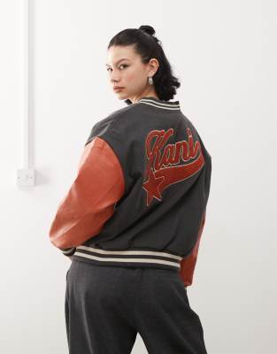 Karl Kani - Collegejacke in Schwarz mit Sternenlogo in Retro-Design