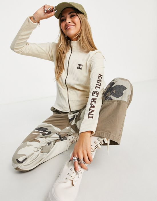 https://images.asos-media.com/products/karl-kani-high-neck-zip-front-crop-top-in-stretch-cord-with-sleeve-logo-part-of-a-set/201471114-1-lightsand?$n_550w$&wid=550&fit=constrain