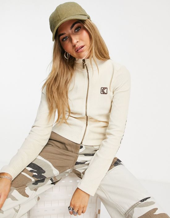 https://images.asos-media.com/products/karl-kani-high-neck-zip-front-crop-top-in-stretch-cord-with-sleeve-logo-part-of-a-set/201471114-4?$n_550w$&wid=550&fit=constrain