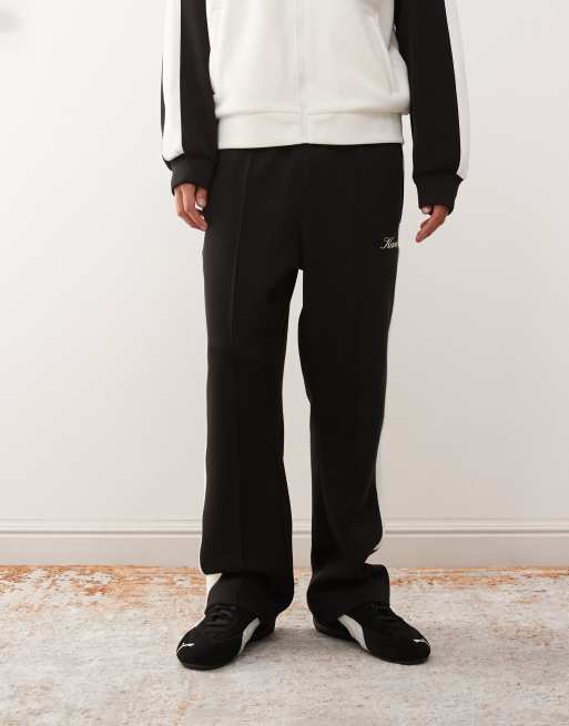 Karl Kani – Jogginghose in Schwarz mit Seitenstreifen in Weiß, Kombiteil, 2 von 5