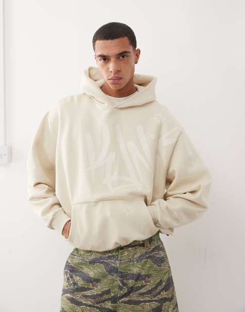 Karl Kani – Kapuzenpullover in Beige mit Signatur-Tag-Grafiklogo - view 1