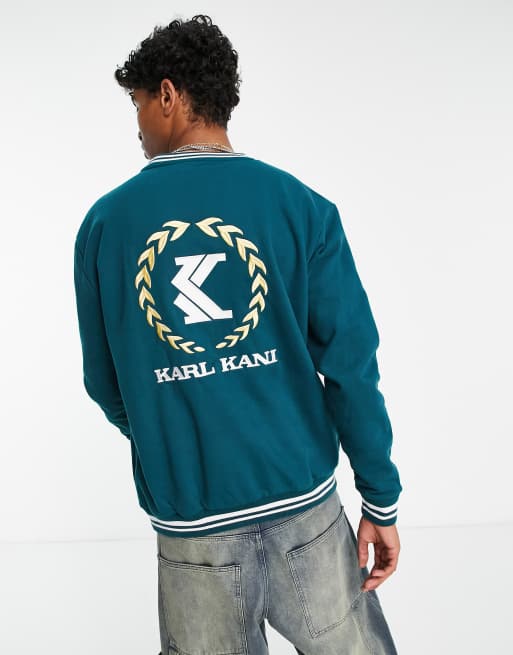 Karl Kani – OG College – Sweatshirt in Grün mit College-Embleme 