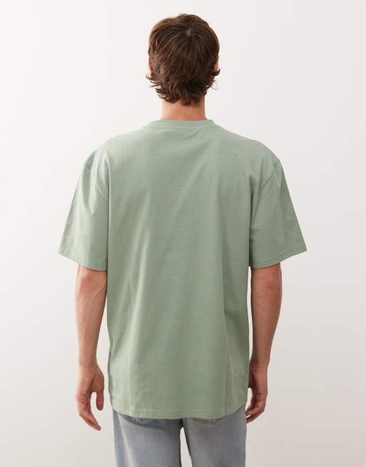 トップス Karl Kani Karl Kani oversized t-shirt in light green with music