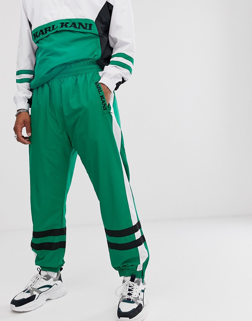 Karl Kani - Pantaloni sportivi stile rétro verdi con fettucce a contrasto-Verde