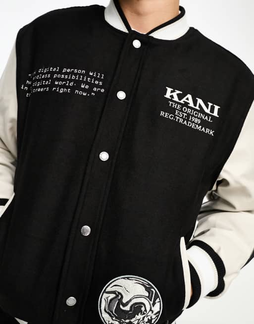 Karl Kani retro block varsity jacket in black and off white with patches |  ASOS