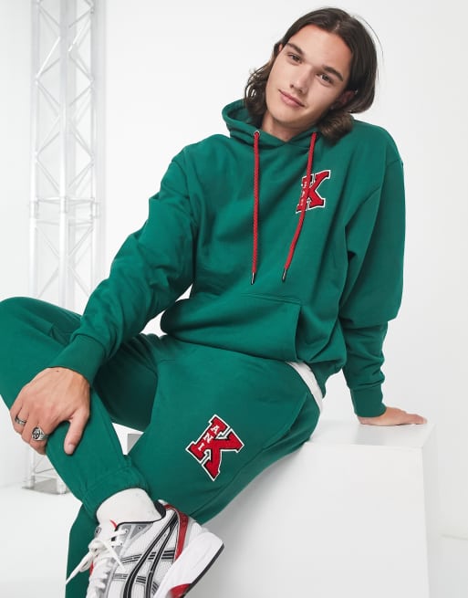 Karl Kani retro patch hoodie in green | ASOS