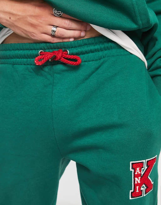 Karl Kani retro patch trackies in green, 3 of 4