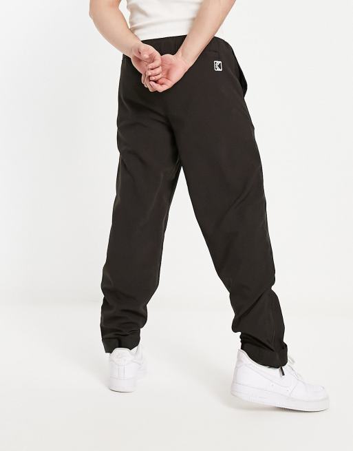 Nike zip hot sale leg pants