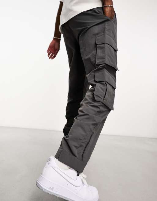 Karl Kani rubber signature cargo pants in washed black