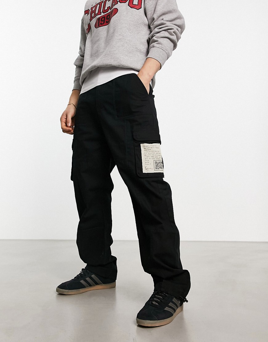 Karl Kani signature cargo trousers in black with woven patch