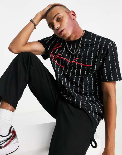 Karl Kani signature logo pinstripe t shirt in black