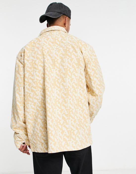 https://images.asos-media.com/products/karl-kani-signature-overshirt-in-sand-with-all-over-logo-print-part-of-a-set/202226148-2?$n_550w$&wid=550&fit=constrain